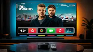 Apple TV 4K box and Siri Remote on a table in front of a TV showing the tvOS home screen, illustrating the tvOS 27 update
